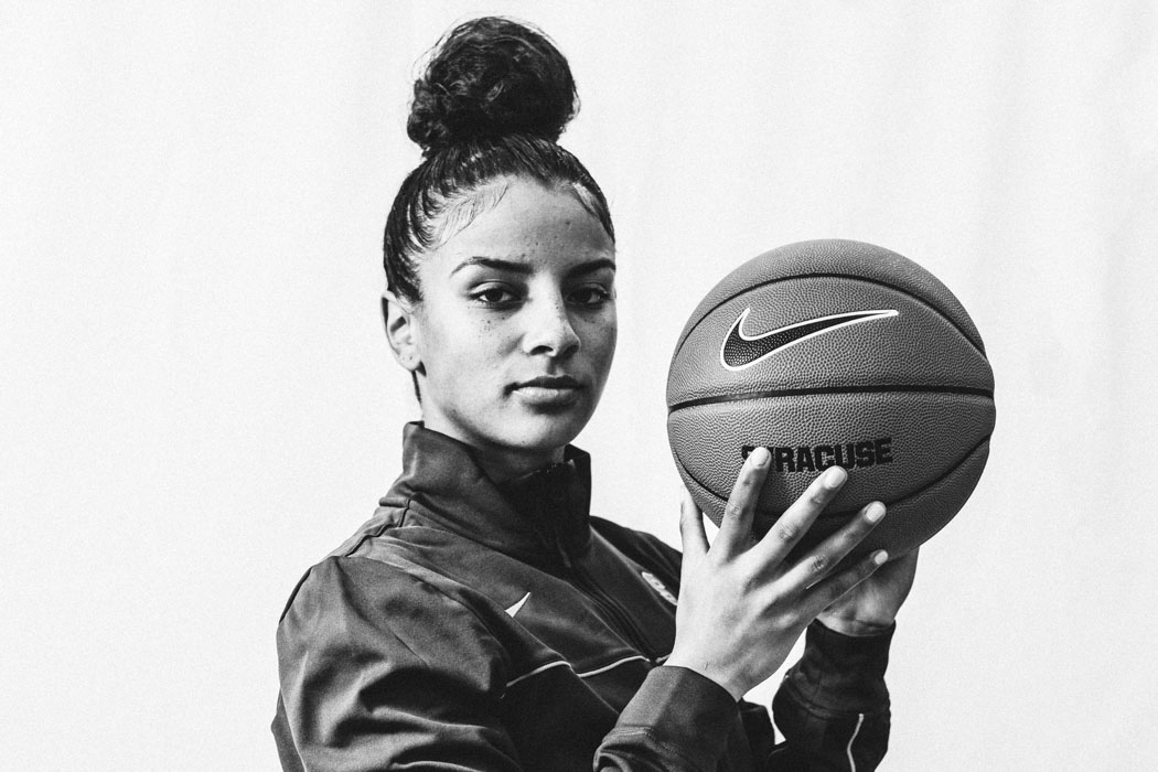 Elemy Colome holding a basketball