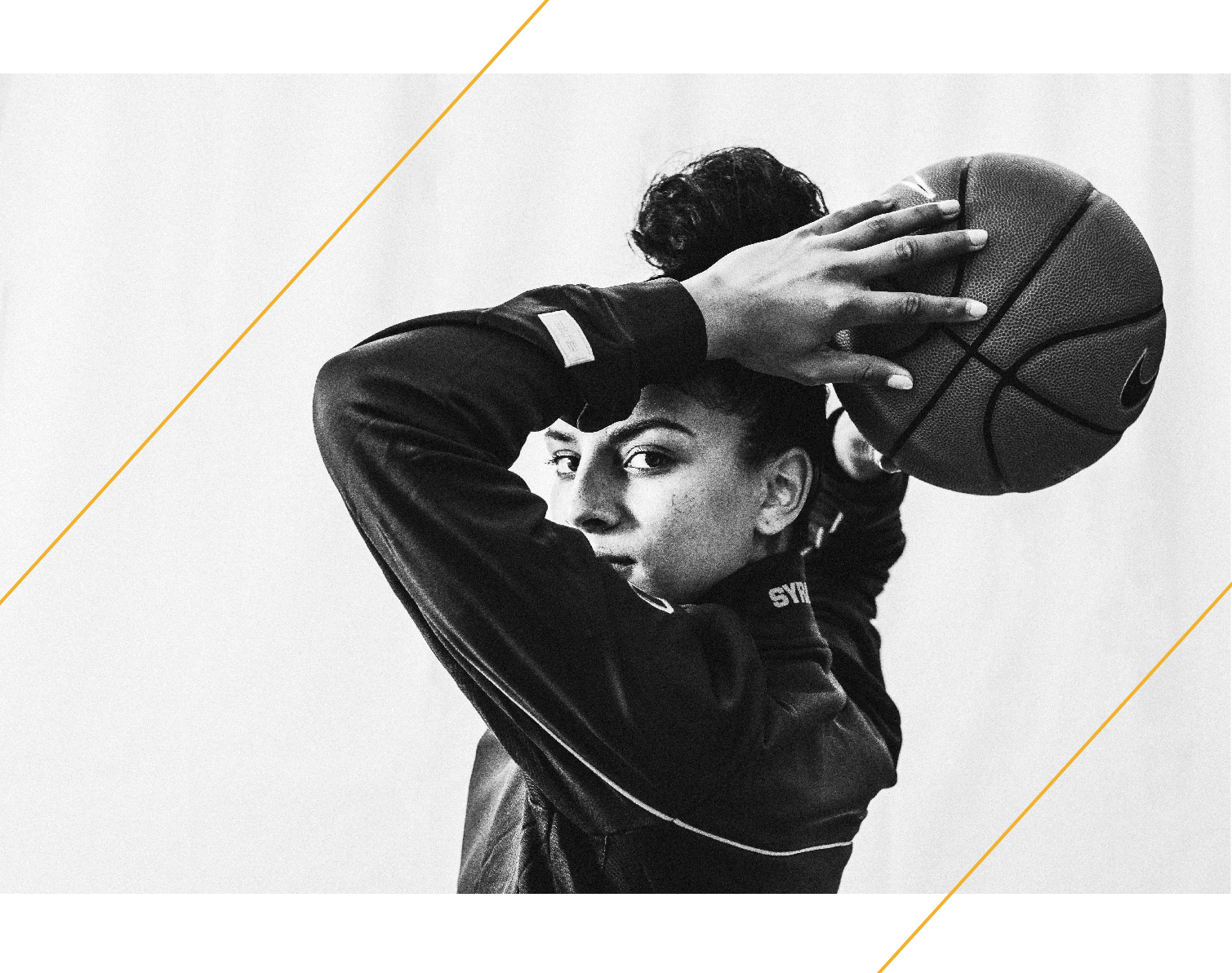 Elemy Colome holding a basketball